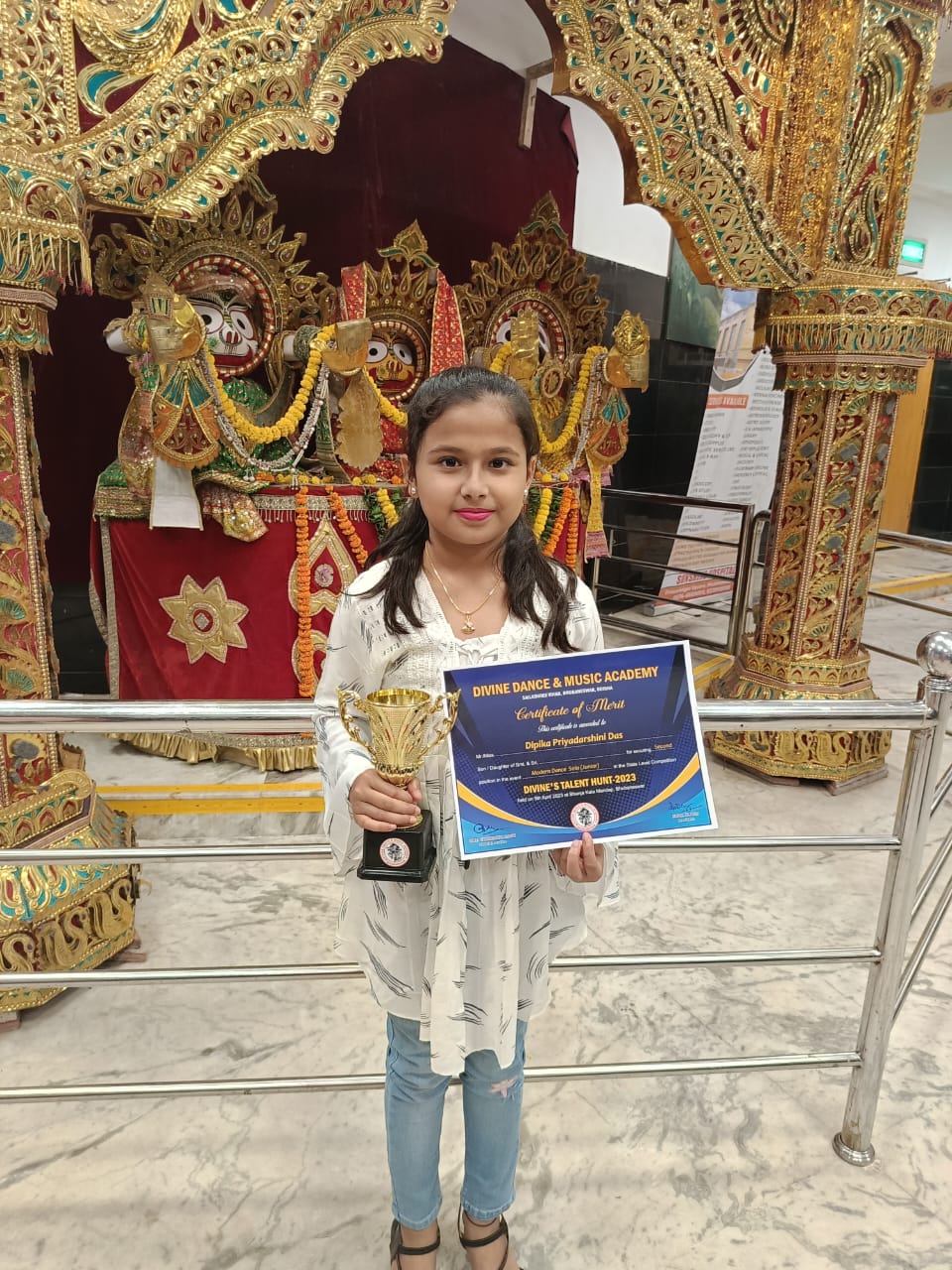 Dipika Priyadarshini of std 7 secured second position in the Modern Dance competition organised by Divine Dance and Music Academy , Bhubaneswar